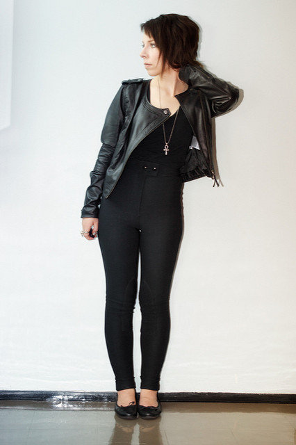 Woman in black leather jacket