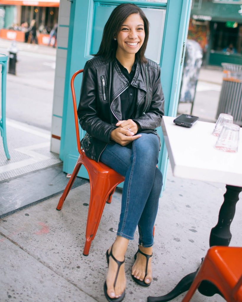 black leather jacket on a smiling woman