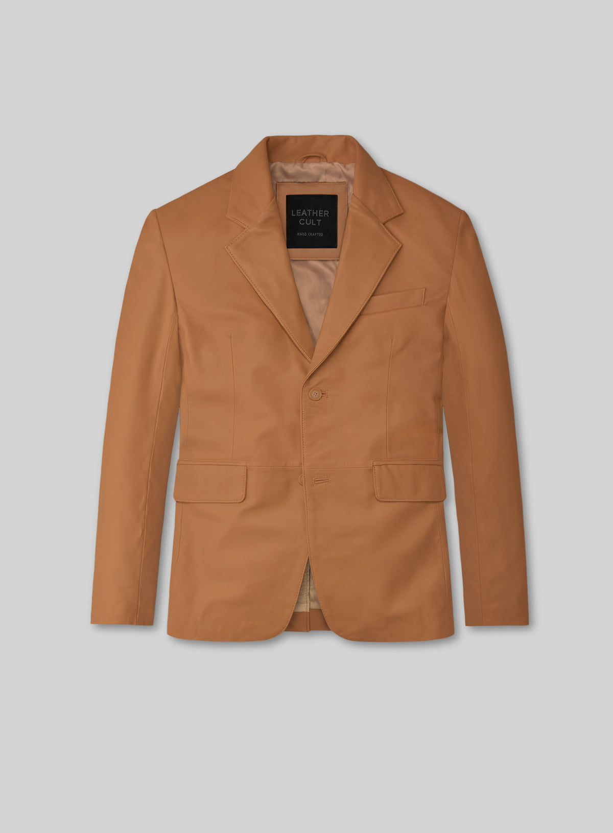 Front view of a tan brown lambskin leather blazer with notch lapel and flap pockets