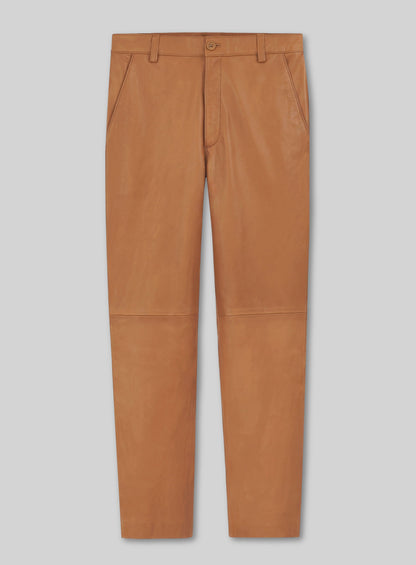 Front view of tan brown lambskin leather trousers with knee seams