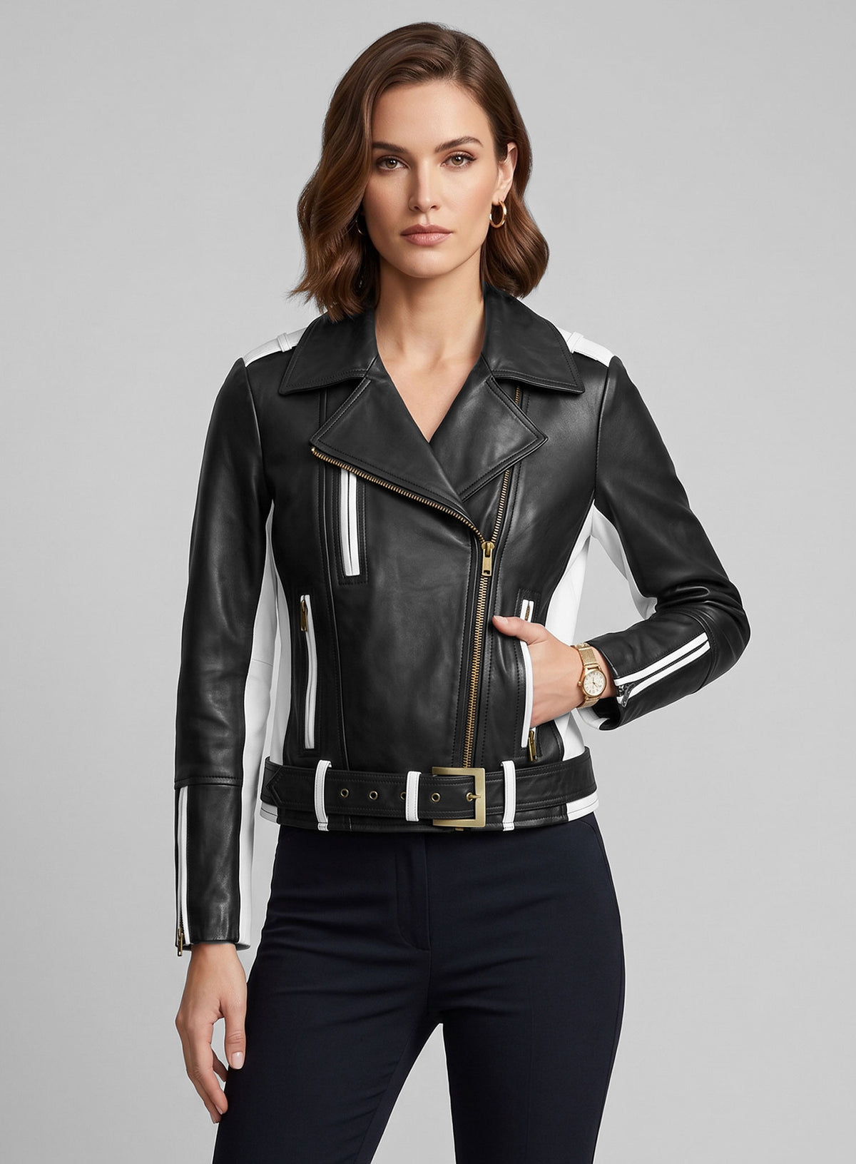 Woman wearing a black leather biker jacket with white stripes and gold zippers
