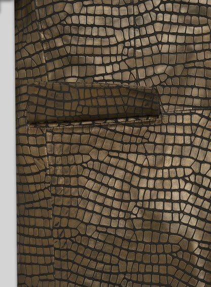 Detail of croc-embossed antique gold leather blazer flap pocket