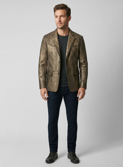 Man wearing an antique gold croc leather western blazer with dark jeans, full length view