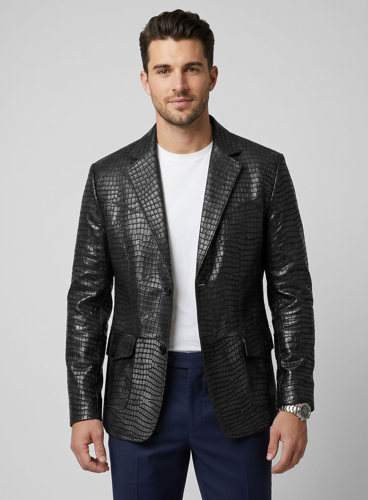 Man wearing a black croc leather western blazer with a white t-shirt, front view