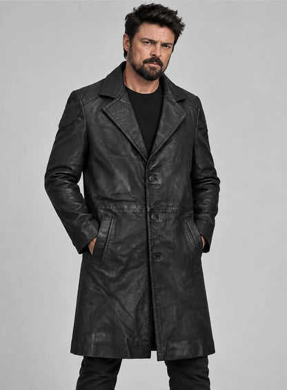 Man wearing a black leather long coat with notch lapel, hands in pockets