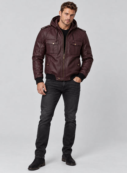Man wearing a burgundy hooded leather bomber jacket with chest flap pockets, full length view, Kellan Lutz inspired