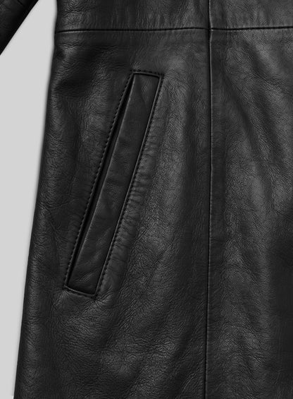 Close-up of black leather long coat slanted welt pocket