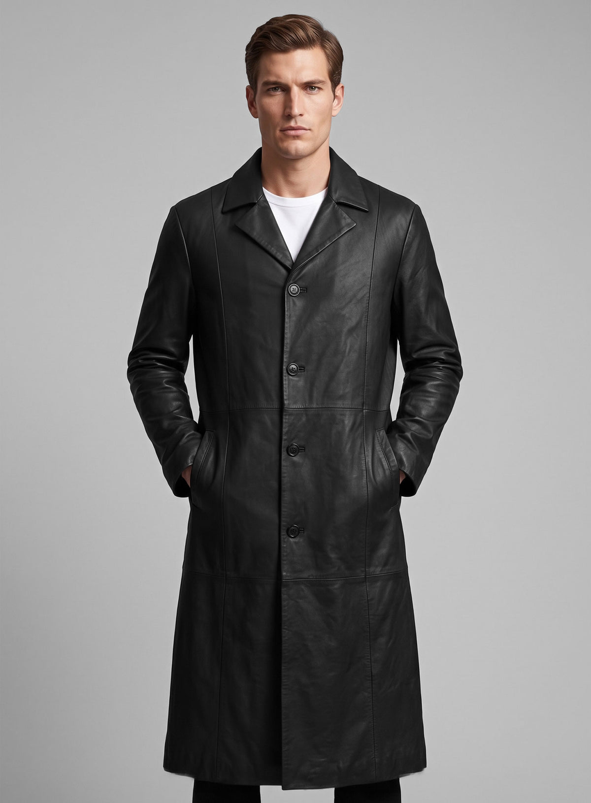 Man wearing a black single-breasted leather long coat, close front view