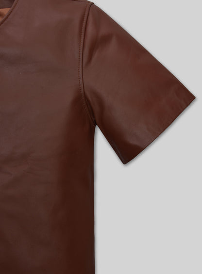 Close-up of brown leather t-shirt sleeve and shoulder seam