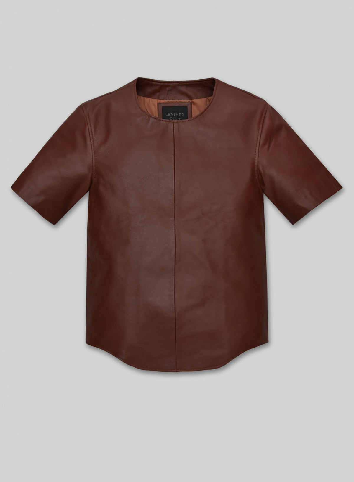 Front view of a brown leather t-shirt with center seam and curved hem