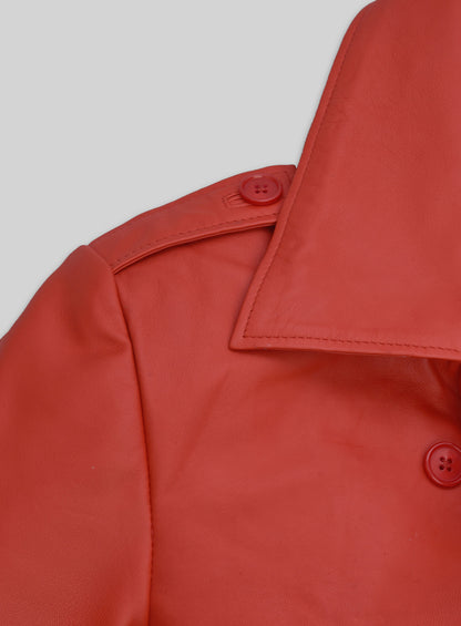 Close-up of red leather long coat collar with epaulette and buttons
