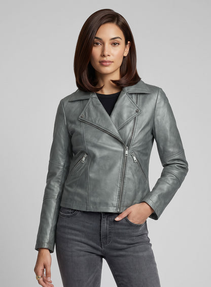 Woman wearing a metallic grey leather biker jacket with asymmetric zip and notch lapel, three-quarter view