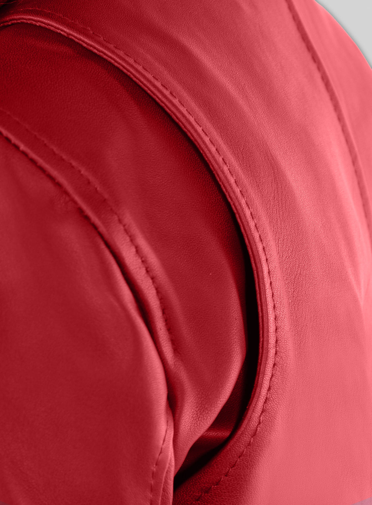Close-up of red lambskin leather shoulder seam stitching