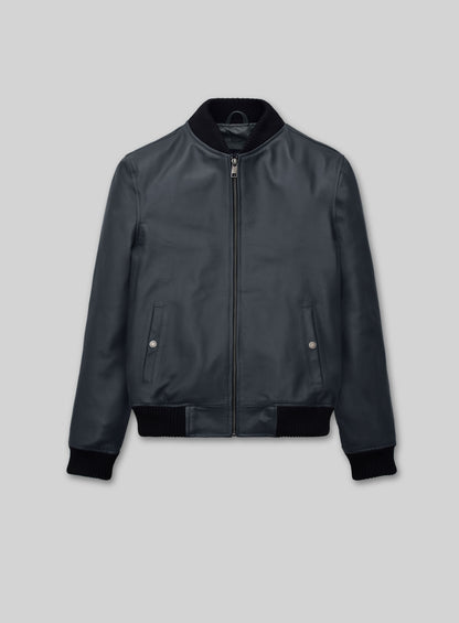 Front view of a dark grey-blue lambskin leather bomber jacket with black ribbed collar and cuffs