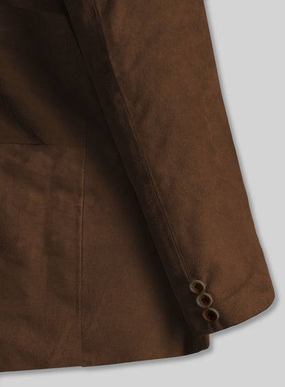 Close-up of brown suede blazer sleeve with three cuff buttons and side panel