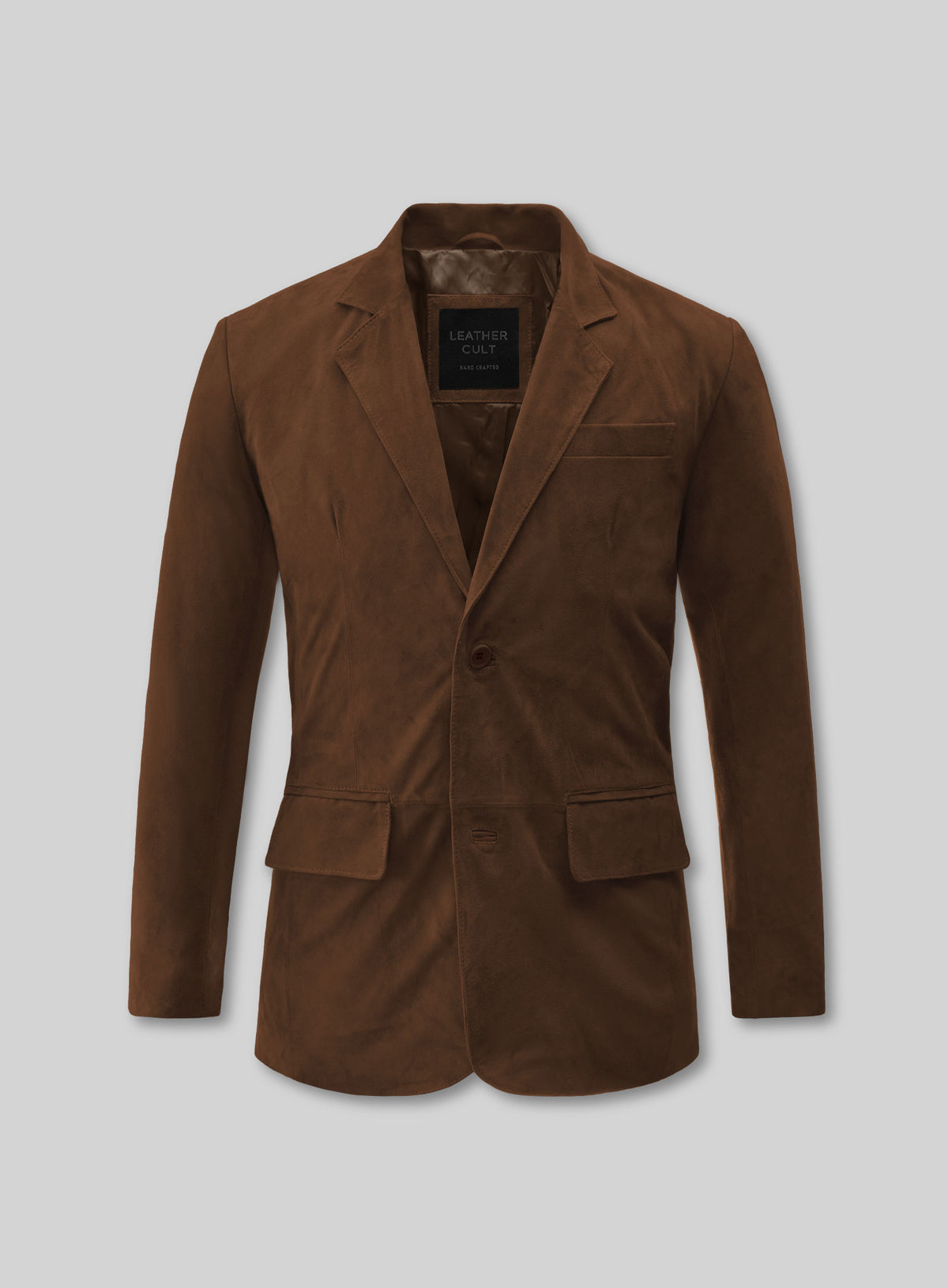Front view of a mid brown suede leather blazer with two buttons and flap pockets