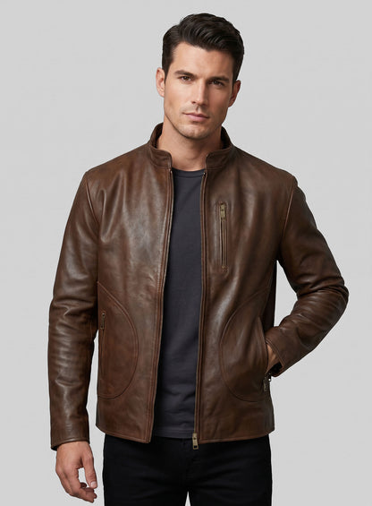 Man wearing a brown leather stand-collar jacket, front view with hand in pocket