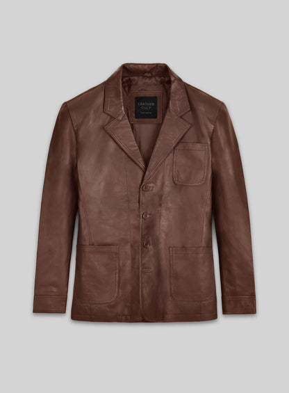 Front view of a tan brown leather blazer with notch lapel, three buttons and patch pockets