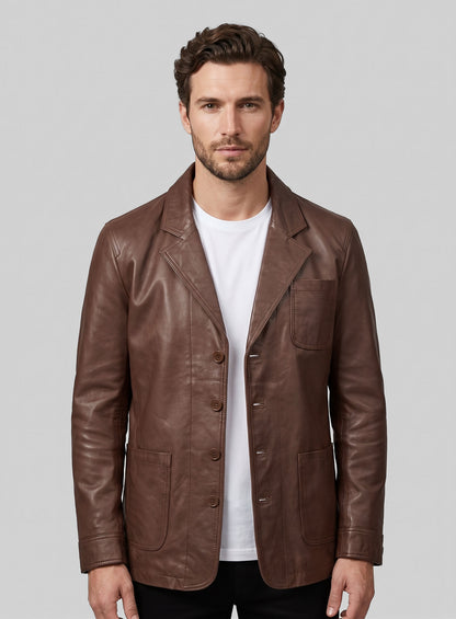 Man wearing a tan brown leather blazer with white t-shirt, front view