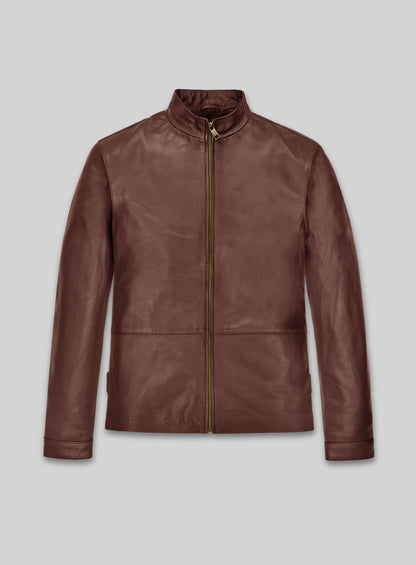 Front view of a brown leather jacket with stand collar and brass zip
