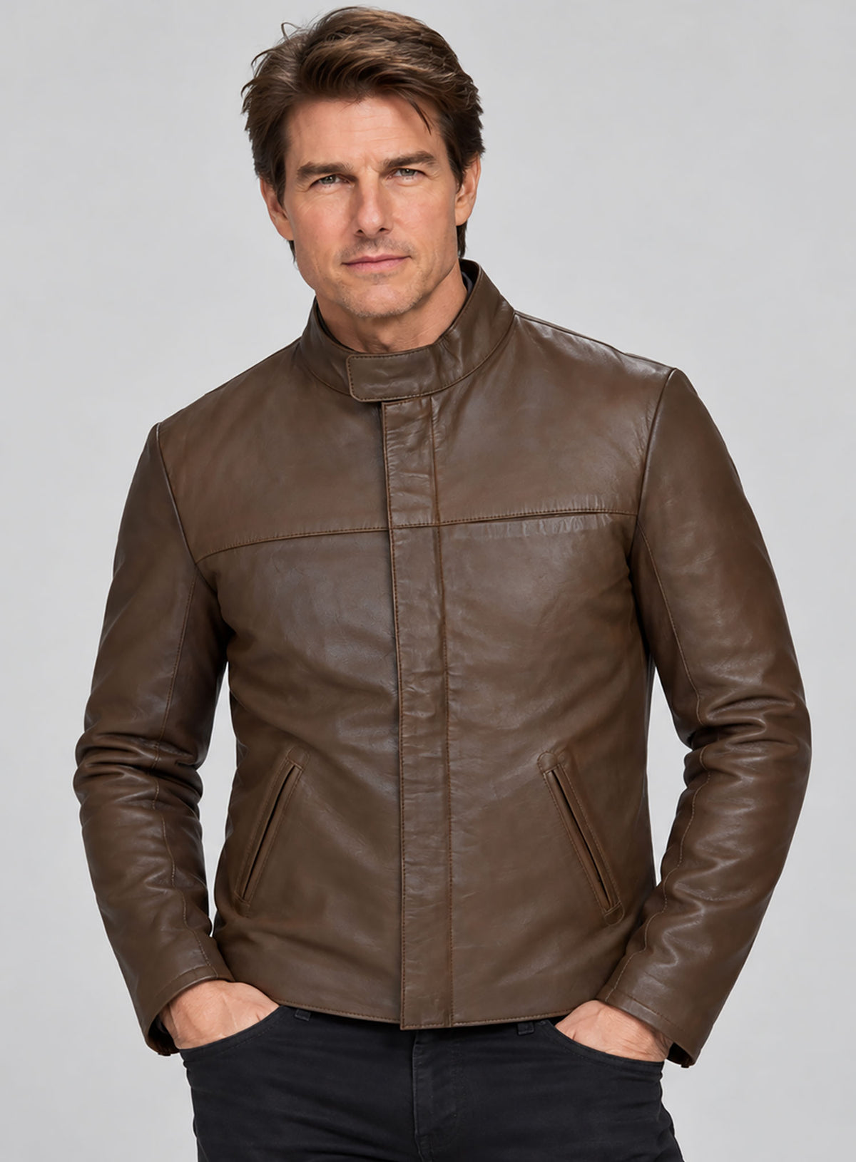 Man wearing a brown leather jacket with stand collar, concealed placket and slanted pockets