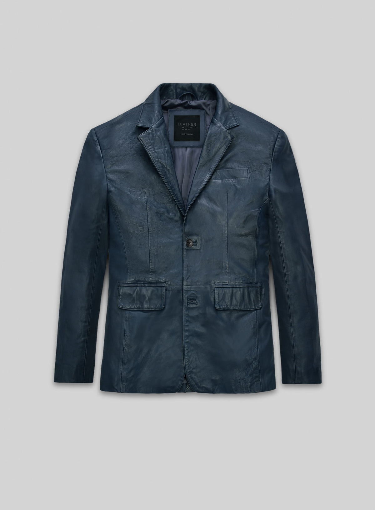 Front view of a blue washed lambskin leather blazer with notch lapel and flap pockets