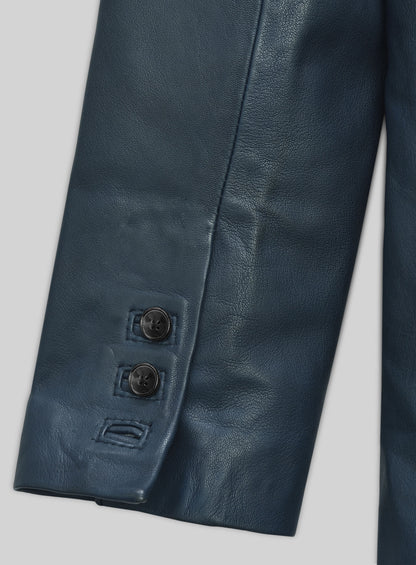 Close-up of sleeve cuff buttons on a blue lambskin leather blazer